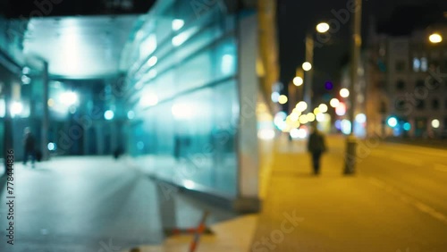 Wallpaper Mural a blurry picture of a building and a street at night Torontodigital.ca