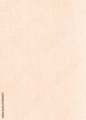 peach colored sheet of paper with texture