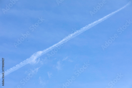 Skies and aeroplane footprints, for the moderately literate chemitrails. False theory, under-education. photo