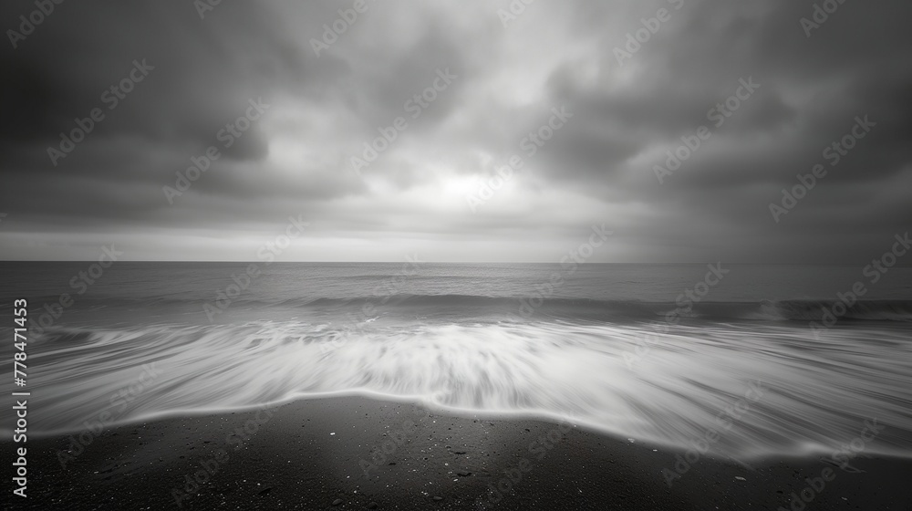 a beach with waves crashing in to shore a beach with waves crashing in to shore