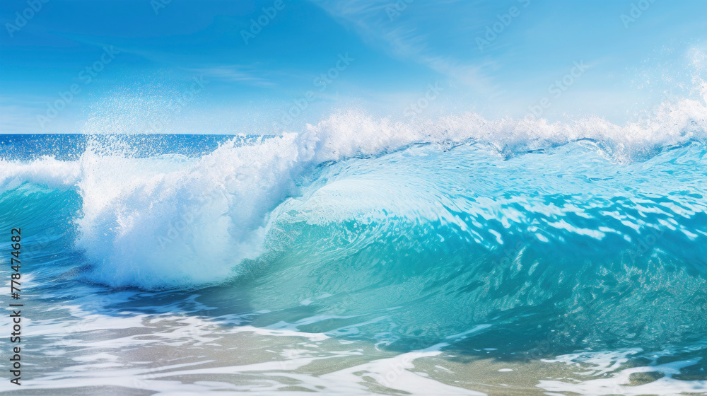 Closeup of breaking wave, sea or ocean, water with blue cloudy sky on horizon - summer, holiday, travel, surf Closeup of breaking wave, sea or ocean, water with blue cloudy sky on horizon - summer, holiday, travel, surf