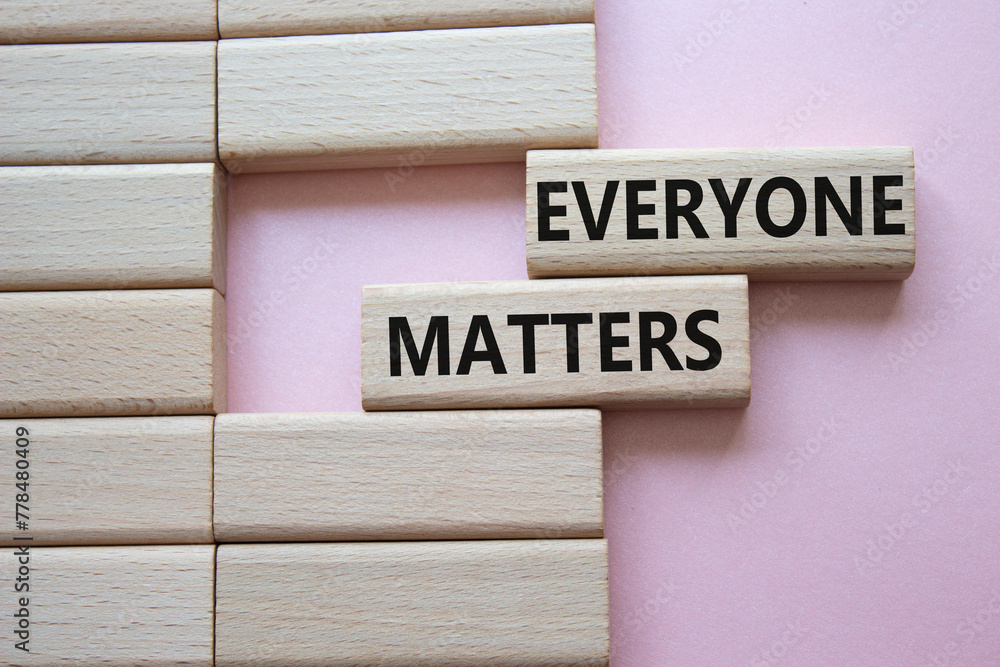 Everyone matters symbol. Concept words Everyone matters on wooden blocks. Beautiful pink background. Business and Everyone matters concept. Copy space. Everyone matters symbol. Concept words Everyone matters on wooden blocks. Beautiful pink background. Business and Everyone matters concept. Copy space.