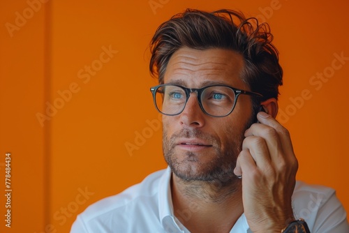 Man With Glasses Talking on Cell Phone