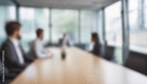 Blurred business meeting in modern conference room office interior