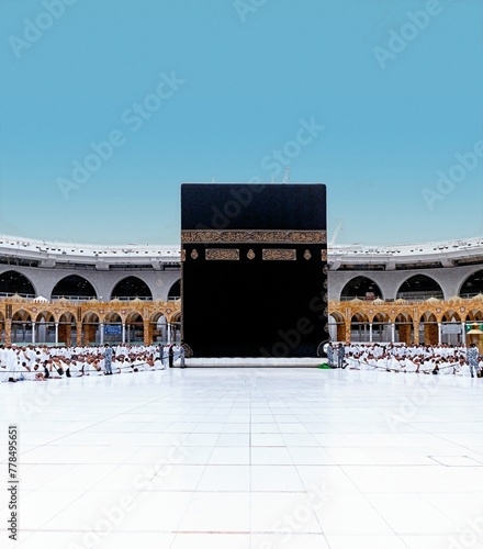 The place where Muslims visit for pilgrimage and umrah. Kaaba, Mecca. Muslims performing circumambulation in the Kaaba photo