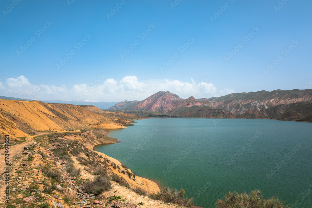 The lake is surrounded by mountains, a beautiful, magnificent natural scene. stock photo