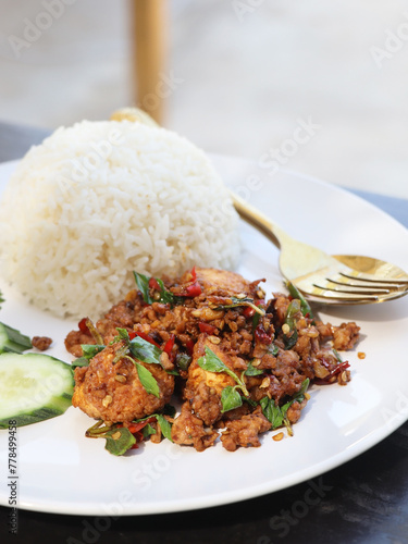 Pad Ka Pao, fried minced pork with basil and rice, popular Thai food