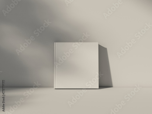 White square Book Mockup front view with blank hard cover standing on white table. 3d rendering