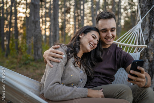 Man and woman young adult couple in nature self portrait selfie ugc