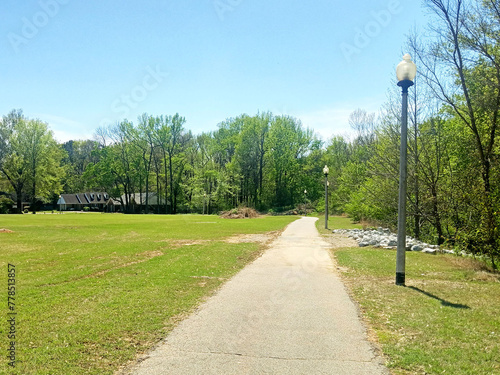 walking trail in the park, lamp pole