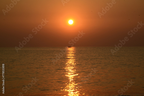 In the evening, when the sun sets on the sea. Can see the horizon. © topten22photo