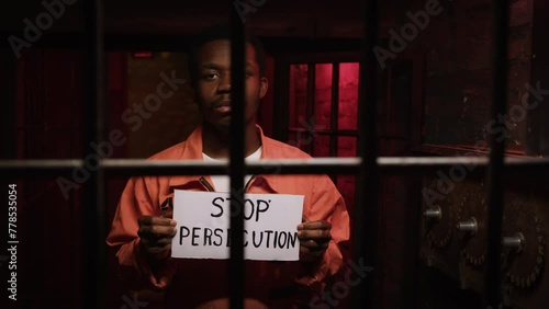 African american political prisioner in picket for stop persecution in jail. photo