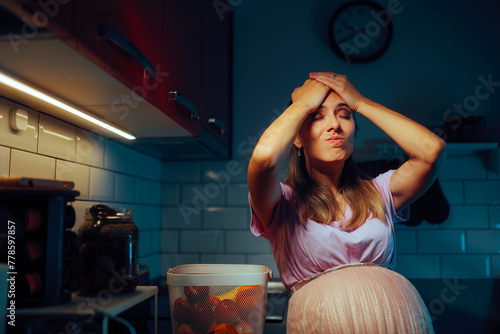 Pregnant Woman Standing in the Kitchen Remembering Something. Preggy mom suffering from pregnancy brain making mistakes 
 photo