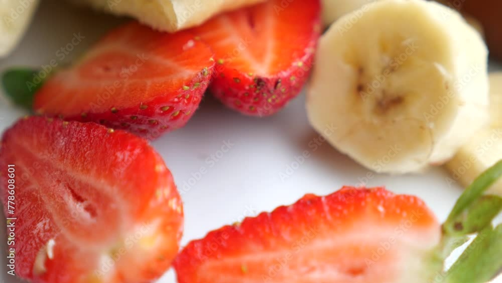 fork pick Ripe Red Strawberries in a bowl on table fork pick Ripe Red Strawberries in a bowl on table