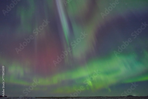 Image captures the otherworldly magic of the aurora borealis, offering a glimpse into the awe-inspiring wonders of the polar regions.