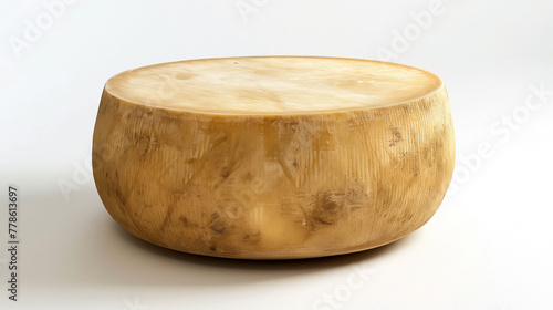 Large round wheel of Parmesan cheese on white background. Textured golden rind, artisanal aged quality. Design for culinary grandeur, rich flavor profile.
