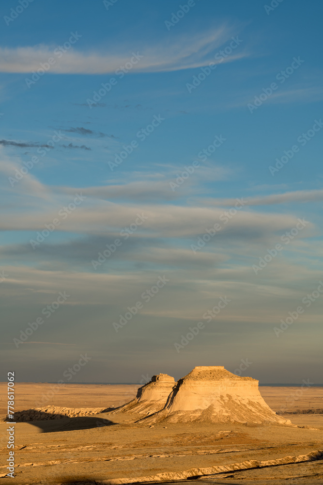 The Pawnee Buttes which rise 300 feet above the Pawnee prairie grassland are eroded geologic landmarks in northeastern Colorado. The Pawnee Buttes which rise 300 feet above the Pawnee prairie grassland are eroded geologic landmarks in northeastern Colorado.