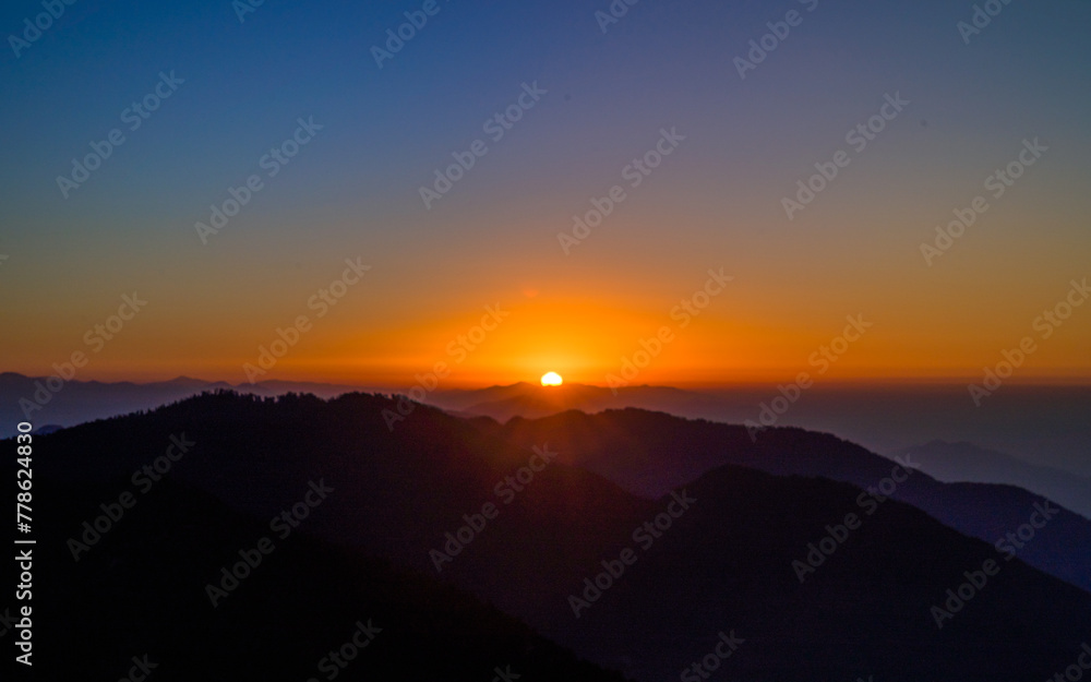 landscape view of sunrise over the mountains in Nepal landscape view of sunrise over the mountains in Nepal