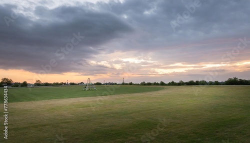 empty lawn at dark cloud © Robert