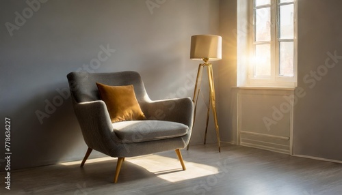 grey armchair on grey minimalist room