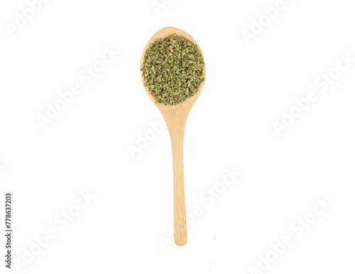 Dried oregano seasoning in a wooden spoon isolated on transparent background
