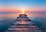 Serene Sunrise over Calm Sea with Wooden Pier Leading into Horizon