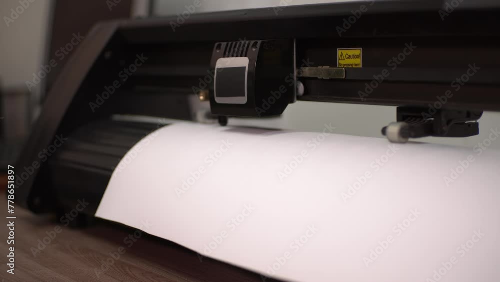 paper plotter. close-up of the device. High-quality shooting in 4K format paper plotter. close-up of the device. High-quality shooting in 4K format