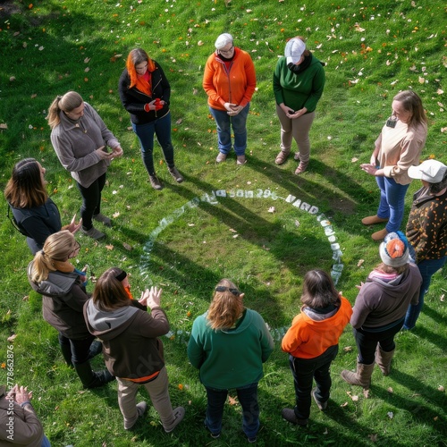 A group of employees gathered in a circle for a team-building exercise. Job 