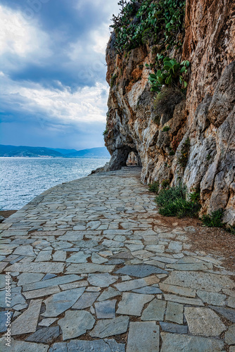 Nafplio, Greece. Walking path by the sea photo