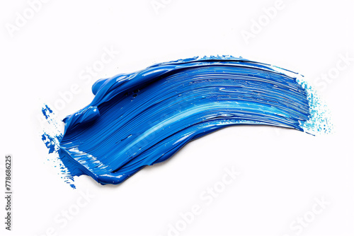 Thick blue acrylic oil paint brush stroke on white background