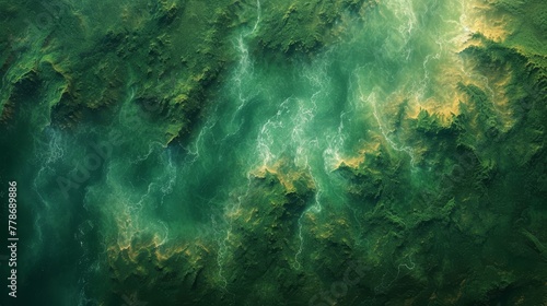 an aerial view of a large body of water with green and yellow swirls on the surface of the water.