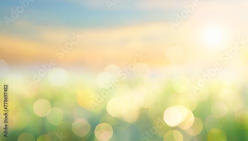abstract bright gradient motion spring or summer landscape texture background with natural green blue bokeh lights and yellow bright sunny sky beautiful backdrop with space for design