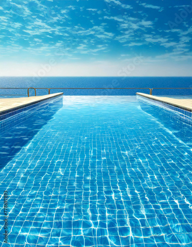 blue infinity pool with the ocean and sea horizon in the background