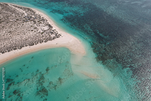 Aerial picture from a scenic flight over the Ningaloo reef in Exmouth, Australia. Beautiful aerial view of Turquoise bay beach, beautiful lagoon in the cape range national park. Beautiful ocean view. photo