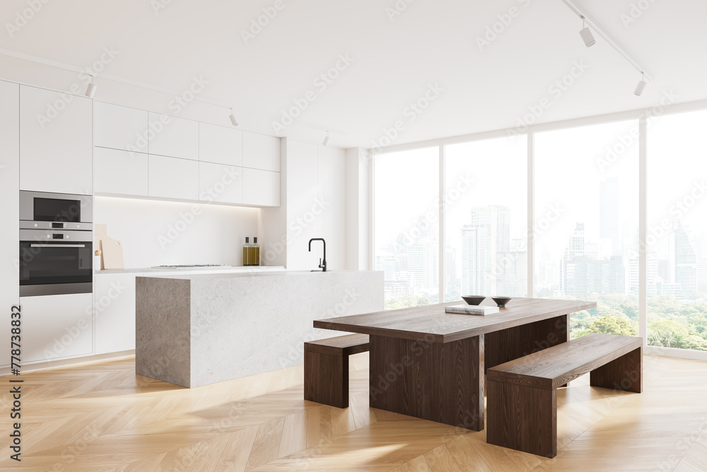 Naklejka premium Cozy home kitchen interior with bar island, eating table and panoramic window