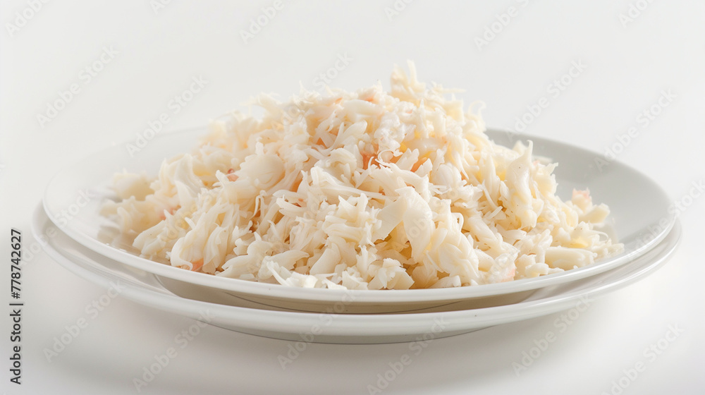 Shredded crab meat mound on white plate. Delicate texture, light sweet flavor for luxurious ravioli filling. Design for premium quality seafood concept.
Shredded crab meat mound on white plate. Delicate texture, light sweet flavor for luxurious ravioli filling. Design for premium quality seafood concept.