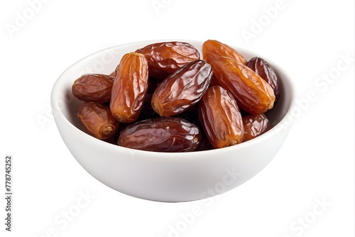 Dates in a white bowl isolated on white