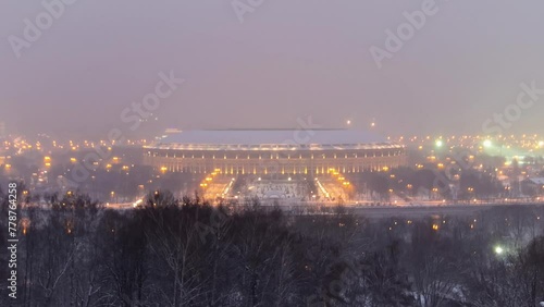 Day to Night Transition Timelapse: Panoramic View of Moscow City, Russia, from Sparrow Hills. Aerial view to stadium after sunset