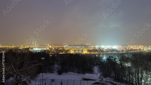 Day to Night Transition Timelapse: Panoramic View of Moscow City, Russia, from Sparrow Hills. Aerial view to illuminated stadium