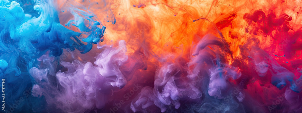 Dramatic smoke and fog in contrasting vivid red, blue, and purple colors.