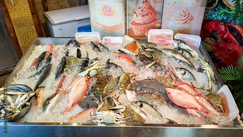 fish counter in a seafood restaurant, fish to choose from