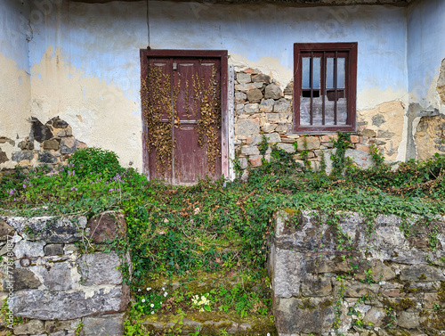 Canvas Print Facade of an abandoned house at Ligüeria village, Piloña municipality, Asturias,