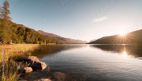 impressive views of untouched wildlife and a magical lake on a sunny day