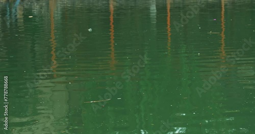 Reflection in the water of the basin of the ancient complex emir's summer residence Sitorai Mohi Xosa. photo