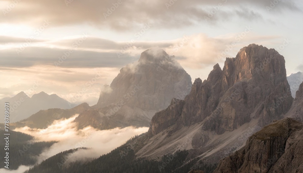a gorgeous view of rocky peaks surrounded by fog italian alps dolomites south tyrol europe