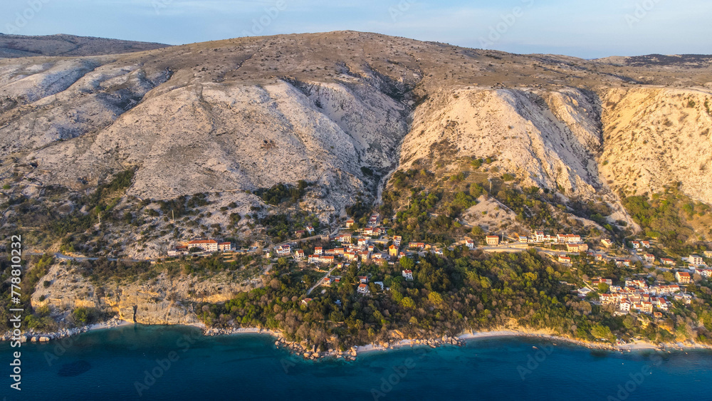 Stara Baška, a tranquil village nestled along the seaside on the island of Krk in Croatia, offers a serene escape amidst azure waters and breathtaking natural beauty during sunset