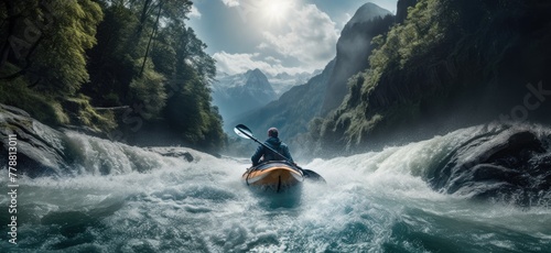 Experience the adrenaline rush of whitewater kayaking as a young man braves turbulent rapids in the mountainous wilderness. © jambulart