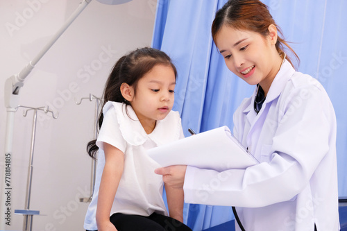 Doctor treating a young patient Pediatric doctor concept.