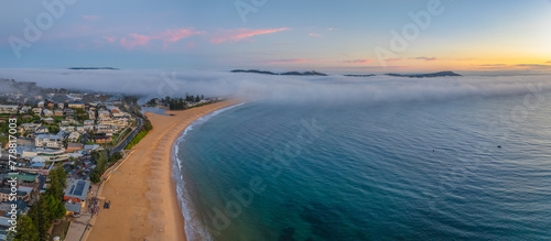 Foggy sunrise at the seaside © Merrillie