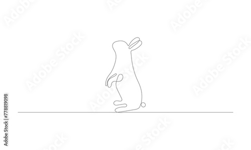 A single, continuous line drawing of the Easter Bunny. Beautiful ear adorned rabbit silhouette in a simple, basic design for a spring themed greeting card and web banner.